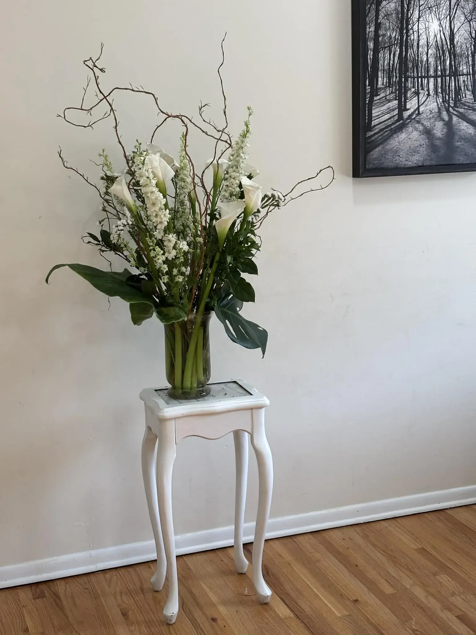 Elegant interior floral styling with tropical foliage and orchids