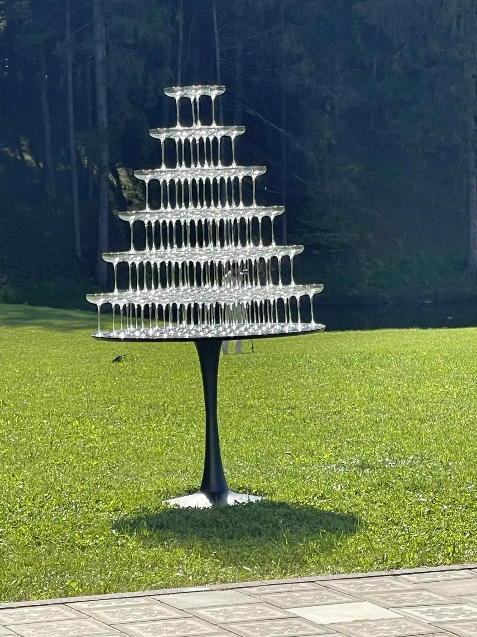 Tiered champagne tower on a lawn